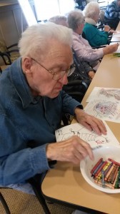 Bob creatively enhances his coloring page